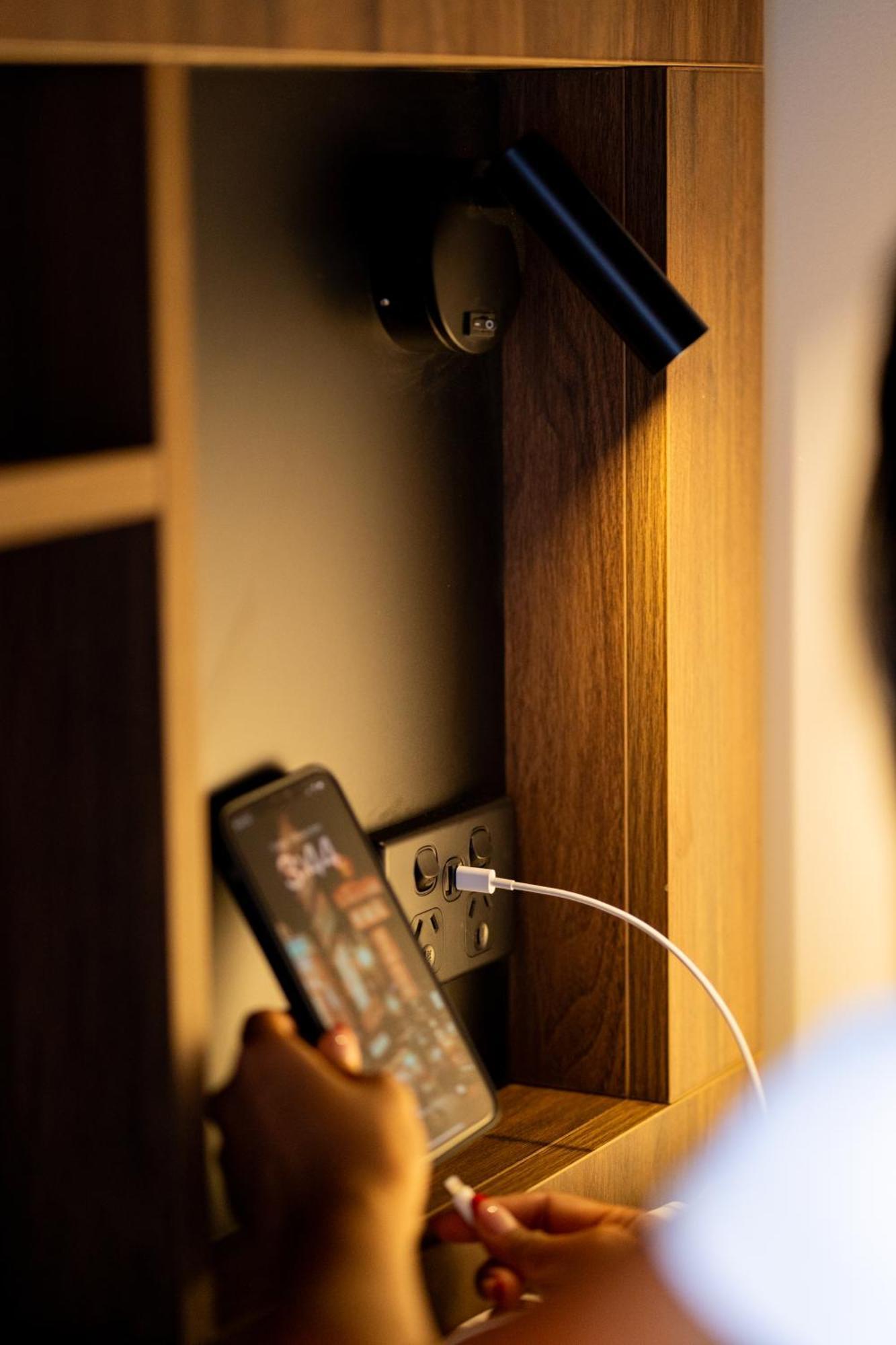 Haka House Wellington Hostel Bagian luar foto A phone plugged into a power socket